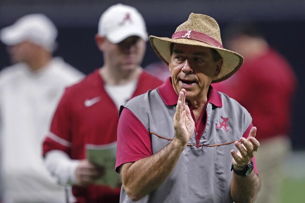 Alabama head coach Nick Saban walks through practice for the upcoming Sugar Bowl, which will be one of the CFP semi-final games, against Clemson, in New Orleans, Thursday, Dec. 28, 2017. (AP Photo/Gerald Herbert)
