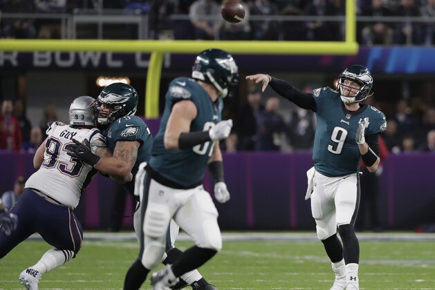 Philadelphia Eagles quarterback Nick Foles (9) throws against the New England Patriots, during the second half of the NFL Super Bowl 52 football game, Sunday, Feb. 4, 2018, in Minneapolis. (AP Photo/Tony Gutierrez)