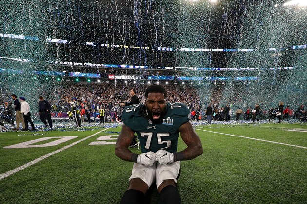 The celebration rains down on Vinny Curry.