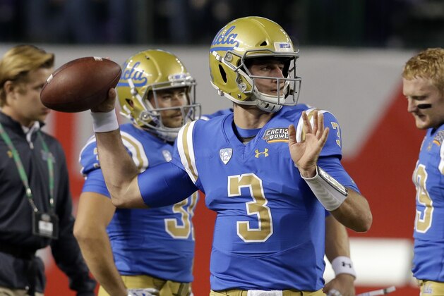 UCLA quarterback Josh Rosen warms up before an NCAA college football bowl game against Kansas State, Tuesday, Dec. 26, 2017, in Phoenix. (AP Photo/Rick Scuteri)