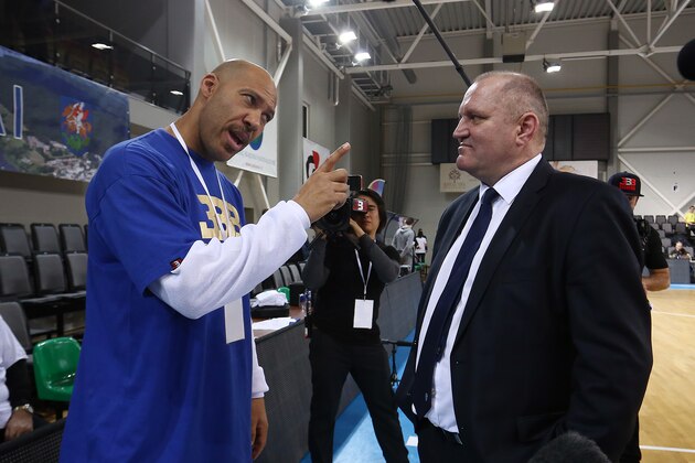 PRIENAI, LITHUANIA - JANUARY 09:  LaVar Ball father of LiAngelo and LaMelo Ball talks with Virginijus Seskus head coach of Vytautas Prienai during the match between Vytautas Prienai and Zalgiris Kauno on January 9, 2018 in Prienai, Lithuania.  (Photo by Alius Koroliovas/Getty Images)