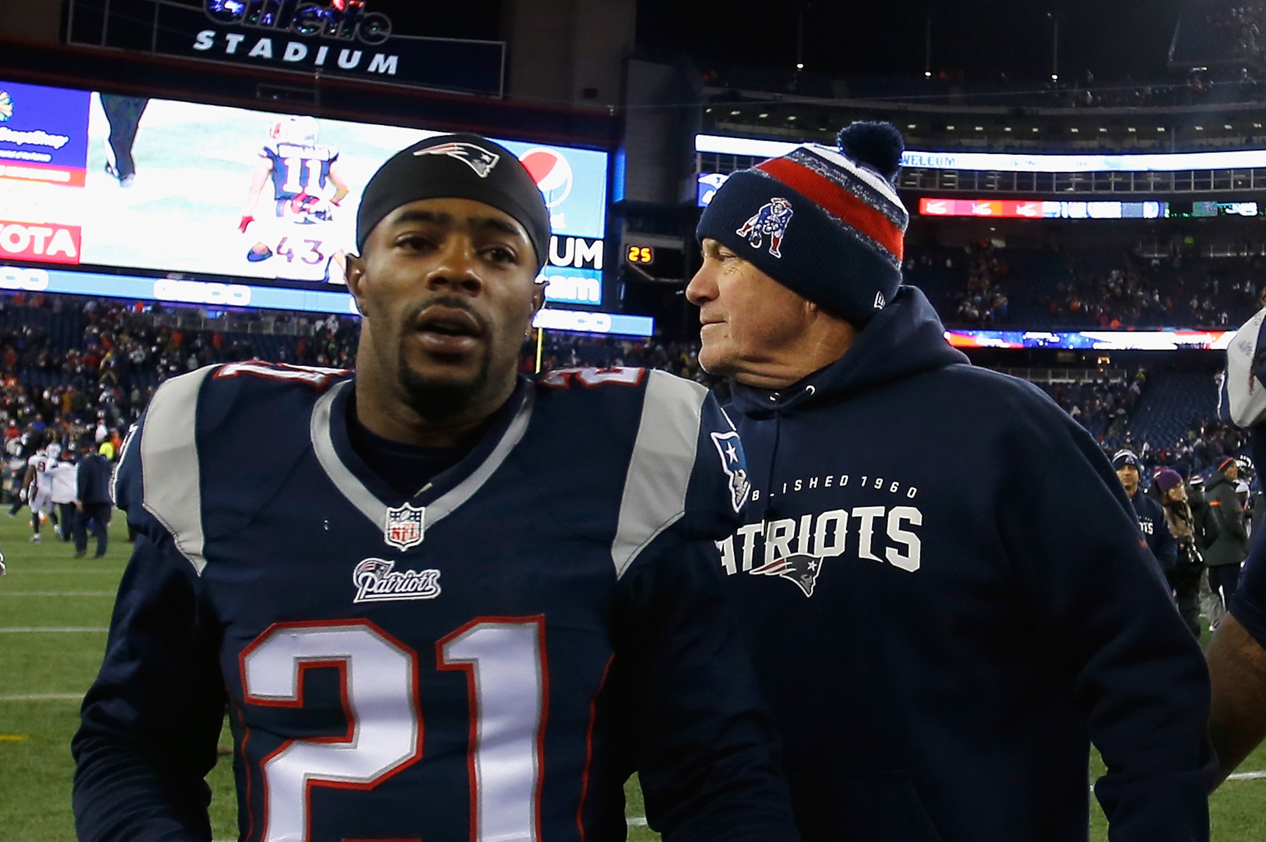 FOXBORO, MA - NOVEMBER 02:  Head coach Bill Belichick of the New England Patriots reacts alongside Malcolm Butler #21 and Akeem Ayers #54 after defeating the Denver Broncos at Gillette Stadium on November 2, 2014 in Foxboro, Massachusetts.  (Photo by Jim Rogash/Getty Images)