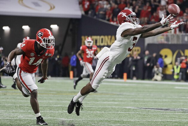 Alabama wide receiver Calvin Ridley can't catch a pass during the second half of the NCAA college football playoff championship game against Georgia Monday, Jan. 8, 2018, in Atlanta. (AP Photo/David J. Phillip)