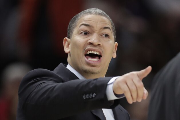 Cleveland Cavaliers head coach Tyronn Lue yells instructions to players in the second half of an NBA basketball game against the Miami Heat, Wednesday, Jan. 31, 2018, in Cleveland. The Cavaliers won 91-89. (AP Photo/Tony Dejak)