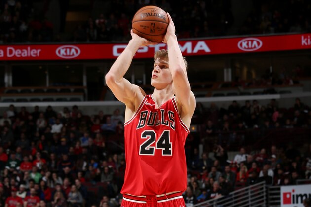 CHICAGO, IL - JANUARY 28: Lauri Markkanen #24 of the Chicago Bulls shoots the ball against the Milwaukee Bucks on January 28, 2018 at the United Center in Chicago, Illinois. NOTE TO USER: User expressly acknowledges and agrees that, by downloading and or using this Photograph, user is consenting to the terms and conditions of the Getty Images License Agreement. Mandatory Copyright Notice: Copyright 2018 NBAE (Photo by Gary Dineen/NBAE via Getty Images)