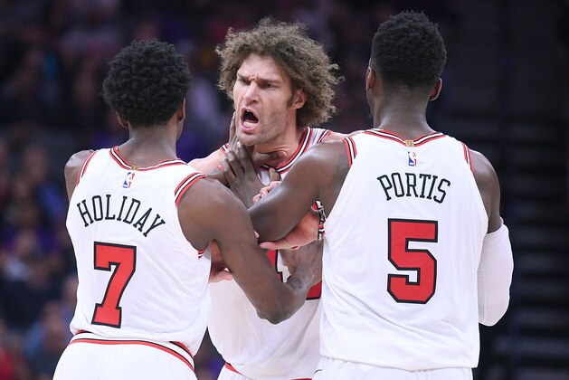 SACRAMENTO, CA - FEBRUARY 05:  Robin Lopez #42 of the Chicago Bulls argues over a foul called by referee Rodney Mott #71 during an NBA basketball game against the Sacramento Kings at Golden 1 Center on February 5, 2018 in Sacramento, California. Mott called two technical fouls on Lopez and ejected him from the game. NOTE TO USER: User expressly acknowledges and agrees that, by downloading and or using this photograph, User is consenting to the terms and conditions of the Getty Images License Agreement.  (Photo by Thearon W. Henderson/Getty Images)
