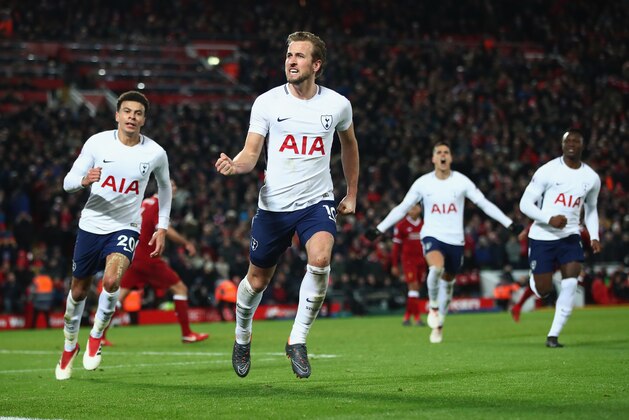 LIVERPOOL, ENGLAND - FEBRUARY 04:  Harry Kane of Tottenham Hotspur celebrates after scoring his sides second goal and his 100th Premier League goal during the Premier League match between Liverpool and Tottenham Hotspur at Anfield on February 4, 2018 in Liverpool, England.  (Photo by Clive Brunskill/Getty Images)