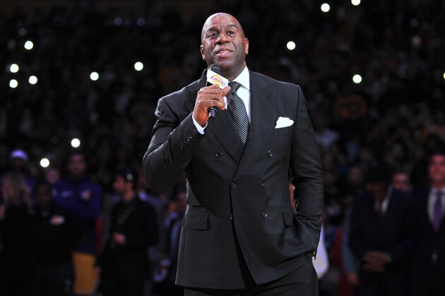 LOS ANGELES, CA - DECEMBER 18:  Magic Johnson speaks at Kobe Bryant's jersey retirement ceremony during halftime of a basketball game between the Los Angeles Lakers and the Golden State Warriors at Staples Center on December 18, 2017 in Los Angeles, California.  (Photo by Allen Berezovsky/Getty Images)