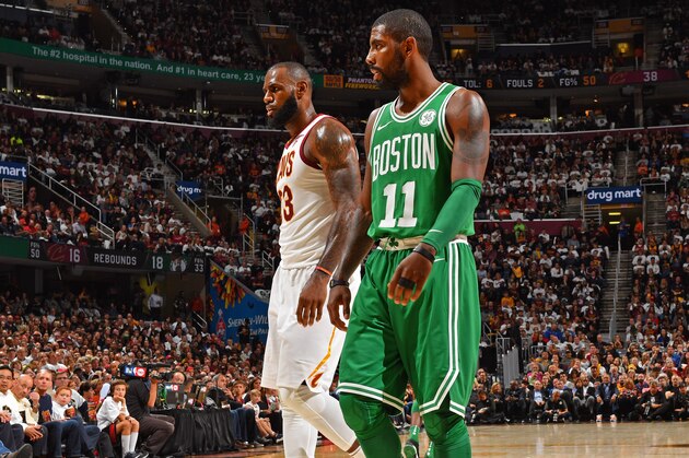 CLEVELAND, OH - OCTOBER 17:  Kyrie Irving #11 of the Boston Celtics and LeBron James #23 of the Cleveland Cavaliers walk up court on October 17, 2017 at Quicken Loans Arena in Cleveland, Ohio. NOTE TO USER: User expressly acknowledges and agrees that, by downloading and/or using this Photograph, user is consenting to the terms and conditions of the Getty Images License Agreement. Mandatory Copyright Notice: Copyright 2017 NBAE (Photo by Jesse D. Garrabrant/NBAE via Getty Images)