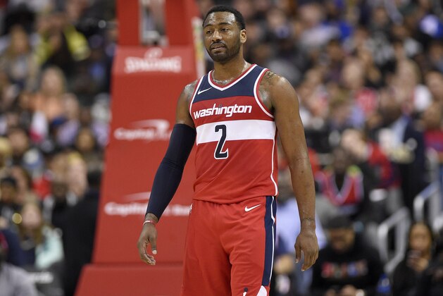 Washington Wizards guard John Wall (2) looks on during the second half of an NBA basketball game against the Milwaukee Bucks, Monday, Jan. 15, 2018, in Washington. The Bucks won 104-95. (AP Photo/Nick Wass)