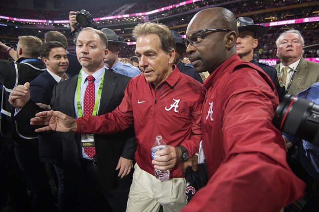 ATLANTA, GA - JANUARY 08: Head Coach Nick Saban of the Alabama Crimson Tide makes his way to the stage after defeating the Georgia Bulldogs during the College Football Playoff National Championship held at Mercedes-Benz Stadium on January 8, 2018 in Atlanta, Georgia. Alabama defeated Georgia 26-23 for the national title. (Photo by Jamie Schwaberow/Getty Images)