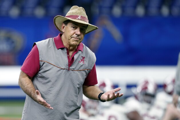 Alabama head coach Nick Saban talks to players during practice for the upcoming Sugar Bowl semi-final playoff game against Clemson, for the NCAA college football national championship, in New Orleans, Saturday, Dec. 30, 2017. (AP Photo/Gerald Herbert)