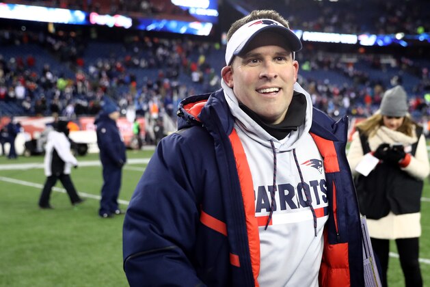 FOXBOROUGH, MA - JANUARY 13:  Offensive Coordinator Josh McDaniels of the New England Patriots reacts after winning the AFC Divisional Playoff game against the Tennessee Titans at Gillette Stadium on January 13, 2018 in Foxborough, Massachusetts.  (Photo by Elsa/Getty Images)