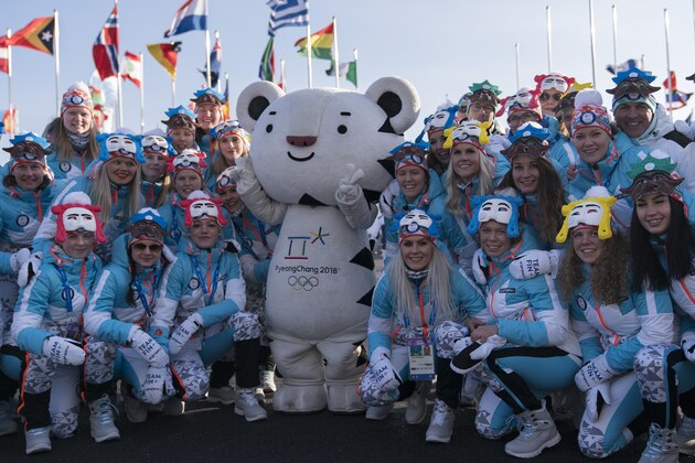 Members of the Finland Olympic Team pose for photos with the Olympic mascot at the end of a welcome ceremony inside the Gangneung Olympic Village prior to the 2018 Winter Olympics in Gangneung, South Korea, Wednesday, Feb. 7, 2018. (AP Photo/Felipe Dana)