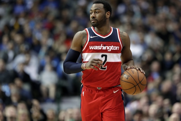 Washington Wizards guard John Wall (2) advances the ball against the Dallas Mavericks during an NBA basketball game, Monday, Jan. 22, 2018, in Dallas. (AP Photo/Tony Gutierrez)
