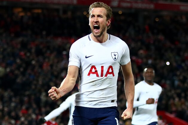 LIVERPOOL, ENGLAND - FEBRUARY 04:  Harry Kane of Tottenham Hotspur celebrates after scoring his sides second goal and his 100th Premier League goal during the Premier League match between Liverpool and Tottenham Hotspur at Anfield on February 4, 2018 in Liverpool, England.  (Photo by Clive Brunskill/Getty Images)