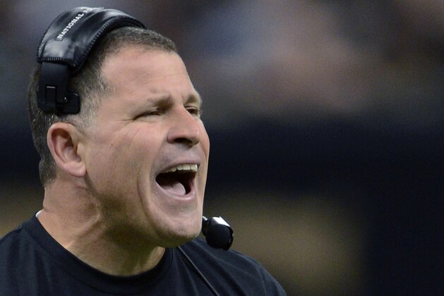 FILE - In this Dec. 29, 2013, file photo, then-Tampa Bay Buccaneers head coach Greg Schiano reacts on the sideline in the first half of an NFL football game against the New Orleans Saints, in New Orleans. Ohio State’s ball-hawking defense has given quarterbacks fits in the first two games against overmatched opponents. But it will be a different ballgame against Oklahoma. “Big boy football,” is how Ohio State defensive coordinator Greg Schiano put it. (AP Photo/Bill Feig, File)