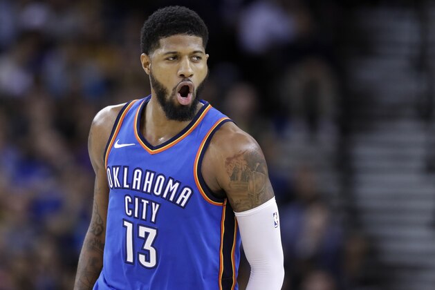 Oklahoma City Thunder's Paul George celebrates after making a 3-point basket against the Golden State Warriors during the second half of an NBA basketball game Tuesday, Feb. 6, 2018, in Oakland, Calif. (AP Photo/Marcio Jose Sanchez)