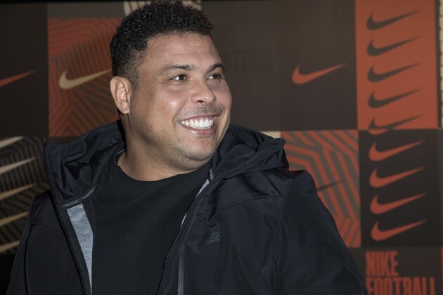 Former soccer player Ronaldo poses for photographers upon arrival at The Beautiful Game event in London, Wednesday, Feb. 7, 2018. (Photo by Vianney Le Caer/Invision/AP)