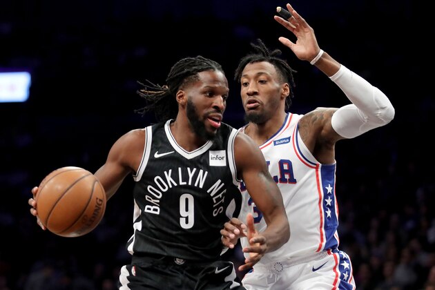 NEW YORK, NY - JANUARY 31: DeMarre Carroll #9 of the Brooklyn Nets works against Robert Covington #33 of the Philadelphia 76ers in the first quarter during their game at Barclays Center on January 31, 2018 in the Brooklyn borough of New York City. NOTE TO USER: User expressly acknowledges and agrees that, by downloading and or using this photograph, User is consenting to the terms and conditions of the Getty Images License Agreement. (Photo by Abbie Parr/Getty Images) NEW YORK, NY - JANUARY 31: DeMarre Carroll #9 of the Brooklyn Nets works against Robert Covington #33 of the Philadelphia 76ers in the first quarter during their game at Barclays Center on January 31, 2018 in the Brooklyn borough of New York City. NOTE TO USER: User expressly acknowledges and agrees that, by downloading and or using this photograph, User is consenting to the terms and conditions of the Getty Images License Agreement. (Photo by Abbie Parr/Getty Images)
