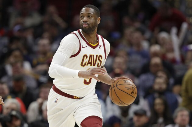 Cleveland Cavaliers' Dwyane Wade drives against the Miami Heat in the first half of an NBA basketball game, Wednesday, Jan. 31, 2018, in Cleveland. (AP Photo/Tony Dejak)