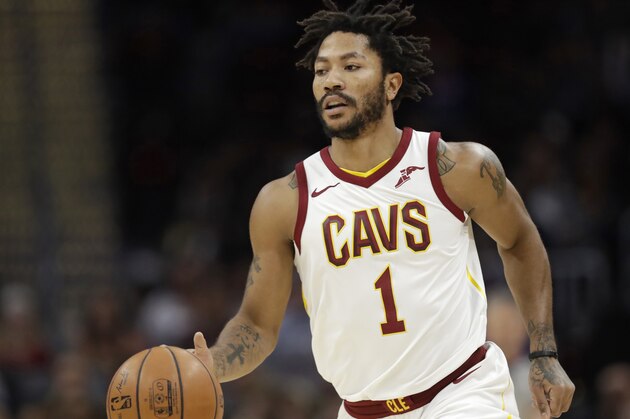 Cleveland Cavaliers' Derrick Rose drives against the Miami Heat in the first half of an NBA basketball game, Wednesday, Jan. 31, 2018, in Cleveland. (AP Photo/Tony Dejak)