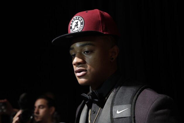 Patrick Surtain Jr., a defensive back at American Heritage High School, is interviewed after announcing he is signing with Alabama on national signing day, Wednesday, Feb. 7, 2018, in Plantation, Fla. (AP Photo/Lynne Sladky)