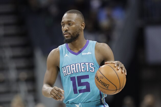 Charlotte Hornets' Kemba Walker (15) drives against the New Orleans Pelicans during the first half of an NBA basketball game in Charlotte, N.C., Wednesday, Jan. 24, 2018. (AP Photo/Chuck Burton)