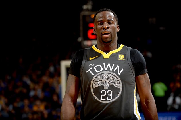 OAKLAND, CA - FEBRUARY 6:  Draymond Green #23 of the Golden State Warriors looks on during the game against the Oklahoma City Thunder on February 6, 2018 at ORACLE Arena in Oakland, California. NOTE TO USER: User expressly acknowledges and agrees that, by downloading and or using this photograph, user is consenting to the terms and conditions of Getty Images License Agreement. Mandatory Copyright Notice: Copyright 2018 NBAE (Photo by Noah Graham/NBAE via Getty Images)