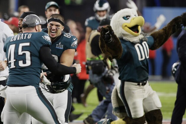 Philadelphia Eagles long snapper Rick Lovato (45) and tight end Trey Burton (88) celebrate after winning the NFL Super Bowl 52 football game against the New England Patriots Sunday, Feb. 4, 2018, in Minneapolis. The Eagles won 41-33. (AP Photo/Frank Franklin II)