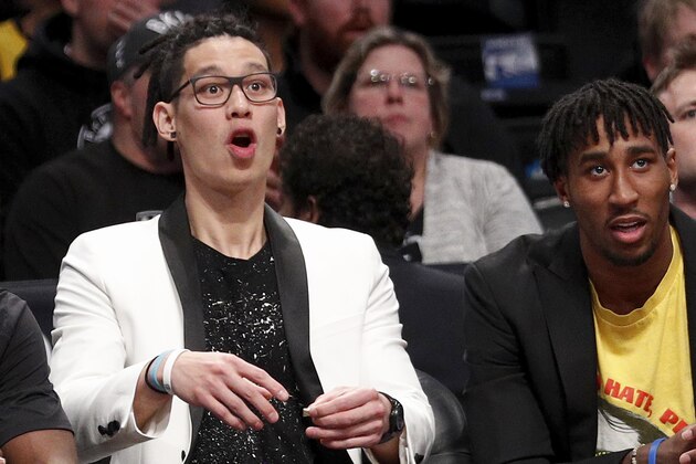 NEW YORK, NY - FEBRUARY 2:  Jeremy Lin of the Brooklyn Nets, who is out for the season after having knee surgery, sits next to Rondae Hollis-Jefferson of the Nets, who did not play tonight, as they react to a teammate shooting and missing a shot as they watch from the bench with teammates during an NBA basketball game against the Los Angeles Lakers on February 2, 2018 at Barclays Center in the Brooklyn borough of New York City. Lakers won 102-99. NOTE TO USER: User expressly acknowledges and agrees that, by downloading and/or using this Photograph, user is consenting to the terms and conditions of the Getty License agreement. Mandatory Copyright Notice (Photo by Paul Bereswill/Getty Images)