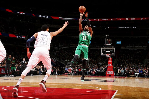 WASHINGTON, DC -  FEBRUARY 8: Kyrie Irving #11 of the Boston Celtics shoots the ball during the game against the Washington Wizards on February 8, 2018 at Capital One Arena in Washington, DC. NOTE TO USER: User expressly acknowledges and agrees that, by downloading and or using this Photograph, user is consenting to the terms and conditions of the Getty Images License Agreement. Mandatory Copyright Notice: Copyright 2018 NBAE (Photo by Ned Dishman/NBAE via Getty Images)