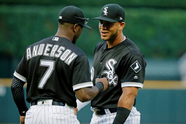 CHICAGO, IL - JULY 26: Tim Anderson #7 of the Chicago White Sox and Yoan Moncada #10 talk while warming up before the game against the Chicago Cubs at Guaranteed Rate Field on July 26, 2017 in Chicago, Illinois. The Chicago Cubs won 8-3.  (Photo by Jon Durr/Getty Images)