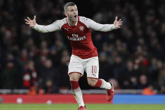 Arsenal's Jack Wilshere shouts during the English League Cup semifinal second leg soccer match between Chelsea and Arsenal at the Emirates stadium in London, Wednesday, Jan.24, 2018. (AP Photo/Matt Dunham)