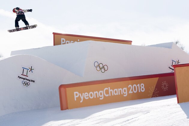 Canadian snowboarder Mark McMorris flies through the air during a slopestyle training session at the Phoenix Snow Park prior to the start of the Pyeongchang 2018 Winter Olympic Games in South Korea. Wednesday, Feb. 7, 2018. (Jonathan Hayward/The Canadian Press via AP)