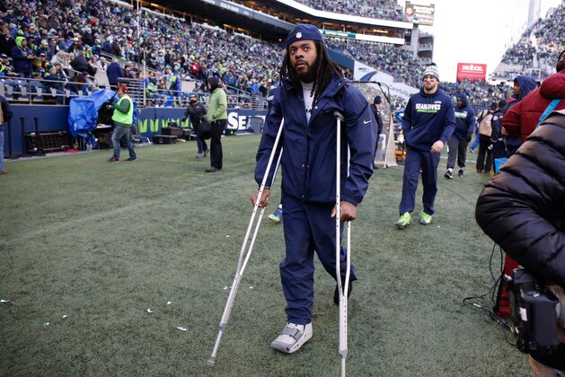 SEATTLE, WA - DECEMBER 31: Cornerback Richard Sherman #25 of the Seattle Seahawks walks on the sidelines in the third quarter against the Arizona Cardinals at CenturyLink Field on December 31, 2017 in Seattle, Washington. (Photo by Otto Greule Jr/Getty Images)
