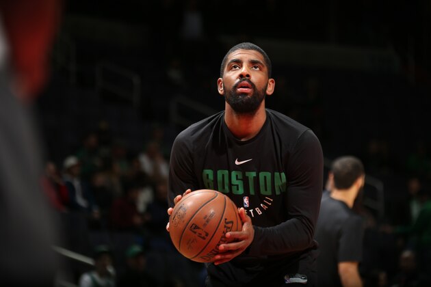 WASHINGTON, DC -  FEBRUARY 8:  Kyrie Irving #11 of the Boston Celtics warms up prior to the game against the Washington Wizards on February 8, 2018 at Capital One Arena in Washington, DC. NOTE TO USER: User expressly acknowledges and agrees that, by downloading and or using this Photograph, user is consenting to the terms and conditions of the Getty Images License Agreement. Mandatory Copyright Notice: Copyright 2018 NBAE (Photo by Ned Dishman/NBAE via Getty Images)
