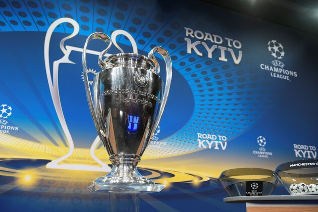 The Champions League trophy is displayed prior to the draw for the round of 16 of the UEFA Champions League football tournament at the UEFA headquarters in Nyon on December 11, 2017. / AFP PHOTO / Fabrice COFFRINI        (Photo credit should read FABRICE COFFRINI/AFP/Getty Images)