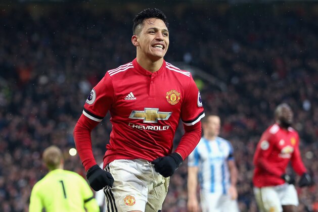 MANCHESTER, ENGLAND - FEBRUARY 03:  Alexis Sanchez of Manchester United celebrates after scoring his sides second goal during the Premier League match between Manchester United and Huddersfield Town at Old Trafford on February 3, 2018 in Manchester, England.  (Photo by Alex Morton/Getty Images)