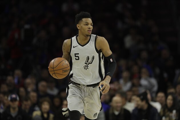San Antonio Spurs' Dejounte Murray in a action during an NBA basketball game against the Philadelphia 76ers, Wednesday, Jan. 3, 2018, in Philadelphia. (AP Photo/Matt Slocum)