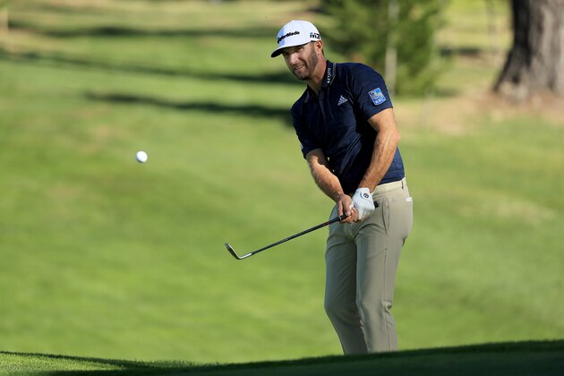 PEBBLE BEACH, CA - FEBRUARY 08:  Dustin Johnson plays his shot on the 18th hole during Round One of the AT&T Pebble Beach Pro-Am at Spyglass Hill Golf Course on February 8, 2018 in Pebble Beach, California. (Photo by Mike Ehrmann/Getty Images)