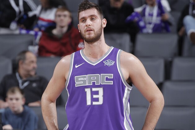 SACRAMENTO, CA - DECEMBER 31: George Papagiannis #13 of the Sacramento Kings looks on during the game against the Memphis Grizzlies on December 31, 2017 at Golden 1 Center in Sacramento, California. NOTE TO USER: User expressly acknowledges and agrees that, by downloading and or using this photograph, User is consenting to the terms and conditions of the Getty Images Agreement. Mandatory Copyright Notice: Copyright 2017 NBAE (Photo by Rocky Widner/NBAE via Getty Images)