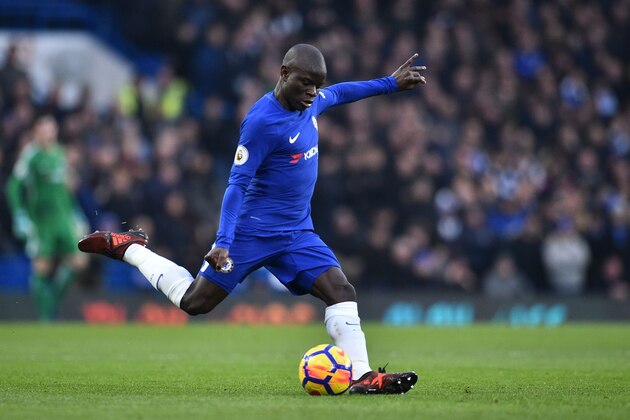 Chelsea's French midfielder N'Golo Kante plays the ball during the English Premier League football match between Chelsea and Leicester City at Stamford Bridge in London on January 13, 2018. / AFP PHOTO / Glyn KIRK / RESTRICTED TO EDITORIAL USE. No use with unauthorized audio, video, data, fixture lists, club/league logos or 'live' services. Online in-match use limited to 75 images, no video emulation. No use in betting, games or single club/league/player publications.  /         (Photo credit should read GLYN KIRK/AFP/Getty Images)