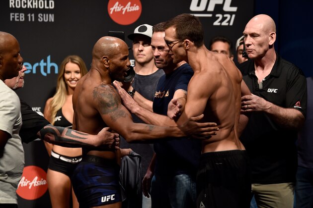 PERTH, AUSTRALIA - FEBRUARY 10:  (L-R) Opponents Yoel Romero of Cuba and Luke Rockhold face off during the UFC 221 weigh-in at Perth Arena on February 10, 2018 in Perth, Australia. (Photo by Jeff Bottari/Zuffa LLC/Zuffa LLC via Getty Images)