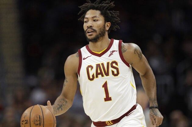 Cleveland Cavaliers' Derrick Rose drives against the Miami Heat in the first half of an NBA basketball game, Wednesday, Jan. 31, 2018, in Cleveland. (AP Photo/Tony Dejak)