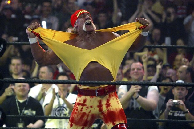 FILE - in this April 3, 2005, file photo, Hulk Hogan fires up the crowd between matches during WrestleMania 21 in Los Angeles. Hogan, perhaps the biggest star in WWE's 50-year history, is set to bring the red-and-yellow back to the sports entertainment behemoth and will host the April 6, 2014, WrestleMania in New Orleans. (AP Photo/Chris Carlson, File)