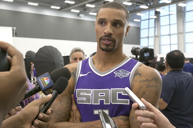 Sacramento Kings guard George Hill talks to reporters during the Kings basketball media day, Monday, Sept. 25, 2017, in Sacramento, Calif. Hill, who played for the Utah Jazz last season signed a free-agent contact with the Kings during the off season. (AP Photo/Rich Pedroncelli)