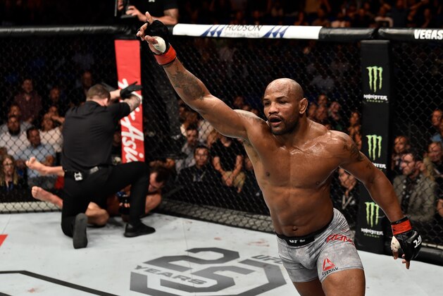 PERTH, AUSTRALIA - FEBRUARY 11:  (R-L) Yoel Romero of Cuba celebrates his knockout victory over Luke Rockhold in their interim middleweight title bout during the UFC 221 event at Perth Arena on February 11, 2018 in Perth, Australia. (Photo by Jeff Bottari/Zuffa LLC/Zuffa LLC via Getty Images)