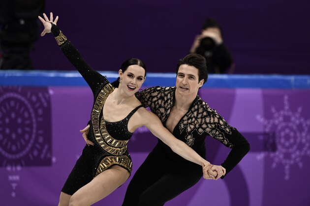 TOPSHOT - Canada's Scott Moir and Canada's Tessa Virtue compete in the figure skating team event ice dance short dance during the Pyeongchang 2018 Winter Olympic Games at the Gangneung Ice Arena in Gangneung on February 11, 2018. / AFP PHOTO / ARIS MESSINIS (Photo credit should read ARIS MESSINIS/AFP/Getty Images) TOPSHOT - Canada's Scott Moir and Canada's Tessa Virtue compete in the figure skating team event ice dance short dance during the Pyeongchang 2018 Winter Olympic Games at the Gangneung Ice Arena in Gangneung on February 11, 2018. / AFP PHOTO / ARIS MESSINIS (Photo credit should read ARIS MESSINIS/AFP/Getty Images)