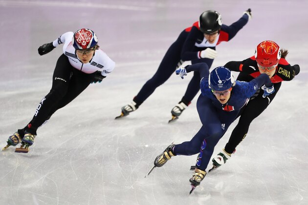 GANGNEUNG, SOUTH KOREA - FEBRUARY 10: Elise Christie of Great Britain is seen racing Chunyu Qu of China during the Women's 500m heats of the Short Track Speed Skating on day one of the PyeongChang 2018 Winter Olympic Games at Gangneung Ice Arena on February 10, 2018 in Gangneung, South Korea. (Photo by Ian MacNicol/Getty Images)